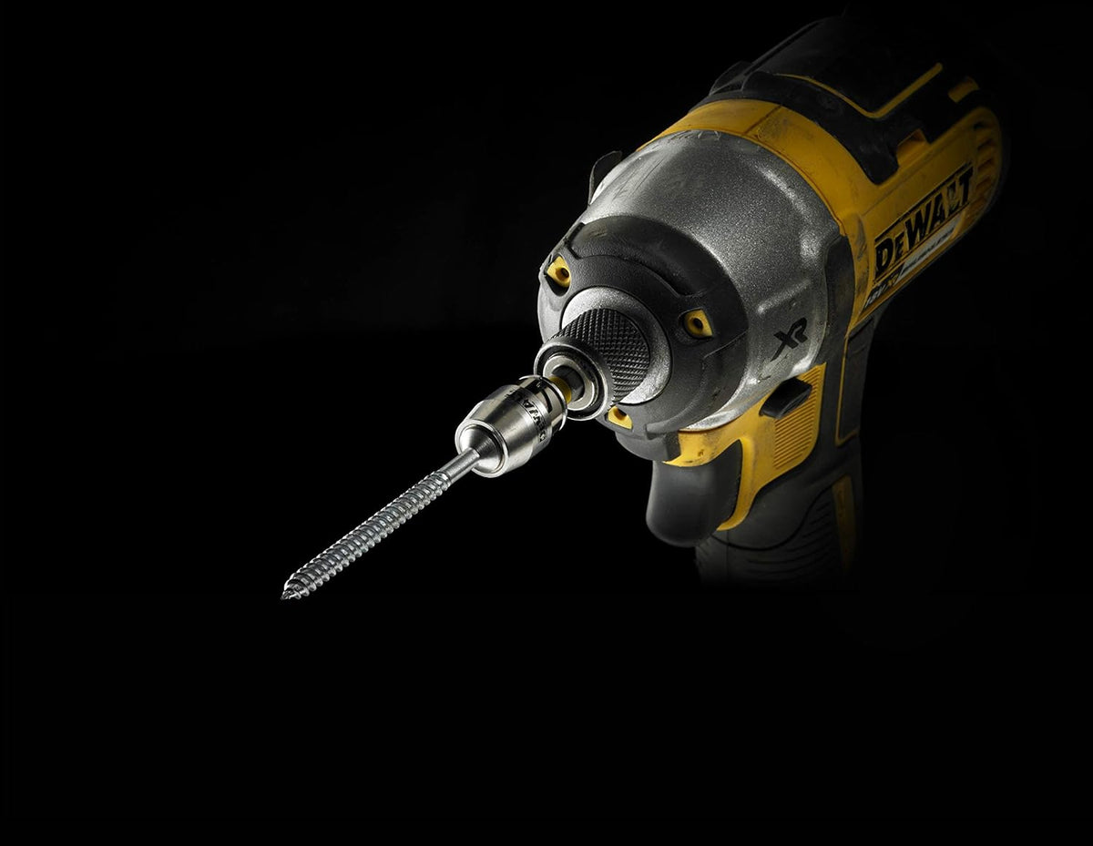 DeWalt drill with magnetic screwlock sleeve and impact torsion bit attached, shown on black background.