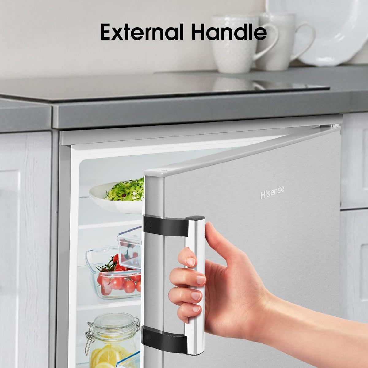 Hand opening Hisense 56cm undercounter fridge door showing external handle and interior shelves with food.