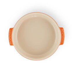 Le Creuset 14cm Volcanic Tapas Dish, durable stoneware, vibrant orange, available at Keans Claremorris.