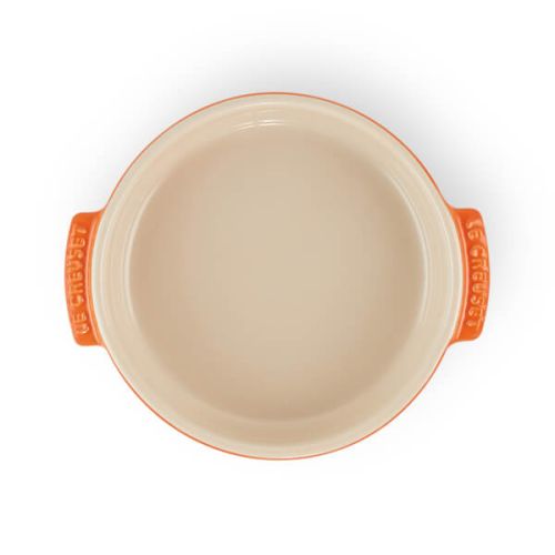Le Creuset 14cm Volcanic Tapas Dish, durable stoneware, vibrant orange, available at Keans Claremorris.