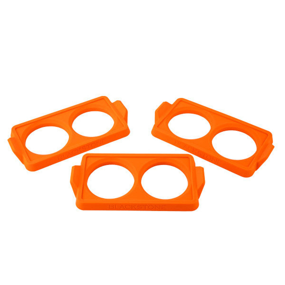 Three orange Blackstone 2 Section Egg Ring Trays with two circular rings each on a white background.