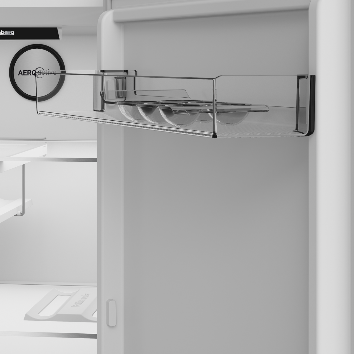 Close-up of the egg tray and AeroActive ventilation inside the Blomberg tall larder fridge door in white.