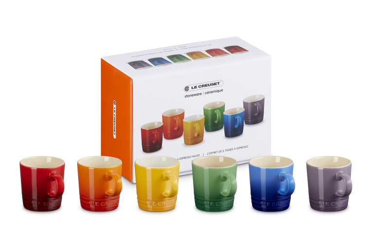 Le Creuset Rainbow Set of 6 espresso mugs in vibrant colors with packaging box behind.