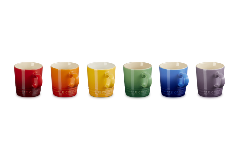 Set of six Le Creuset espresso mugs in red, orange, yellow, green, blue, and purple, front view.