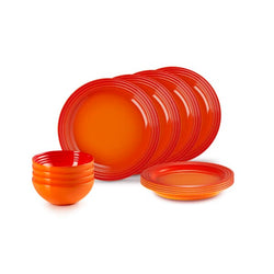 Le Creuset 12 Piece Volcanic Dinner Set with plates and bowls, iconic three-ring design, available at Keans Claremorris.