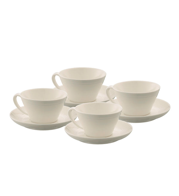 Belleek Living Ripple 4-piece fine china teacup and saucer set with contemporary design, available at Kean’s Claremorris. –