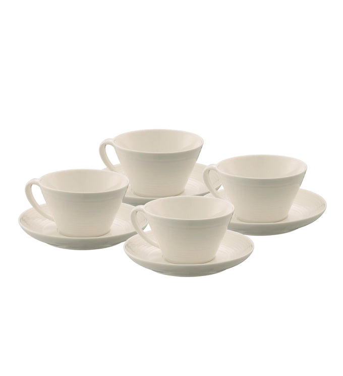 Belleek Living Ripple 4-piece fine china teacup and saucer set with contemporary design, available at Kean’s Claremorris. –