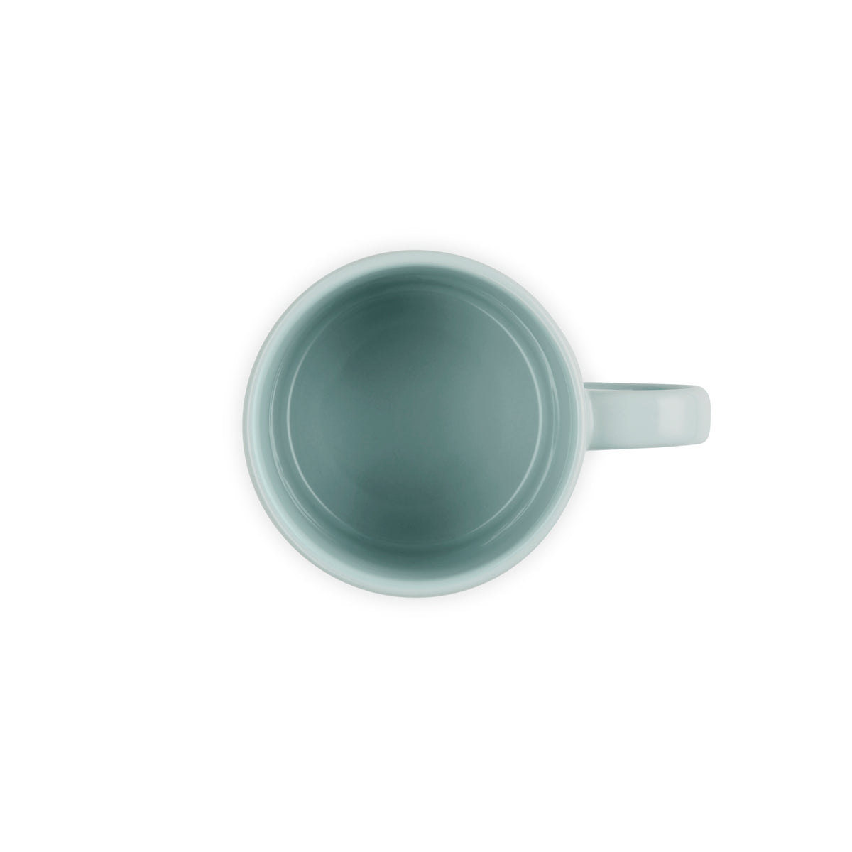 Top view of a sea salt blue Le Creuset London Mug with handle on the right side on a white background