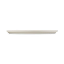 Le Creuset Oval Platter in Meringue color, durable stoneware, elegant design - available at Keans Claremorris