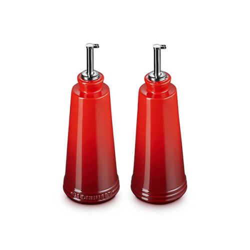 Le Creuset Stoneware Signature Oil and Vinegar Set in Cerise red, durable and stylish, available at Keans Claremorris.