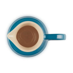 Le Creuset Stoneware Breakfast Jug 600ml in Deep Teal, durable and stylish - available at Keans Claremorris
