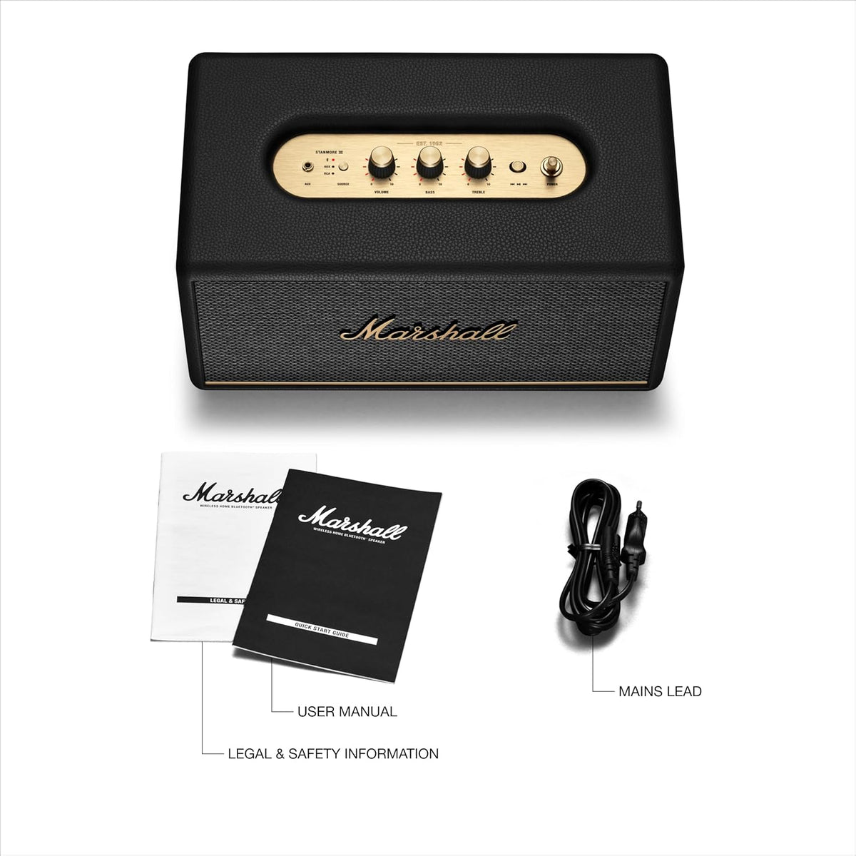 Marshall Stanmore III Bluetooth speaker in black with control knobs, manuals, and power cable on white background.