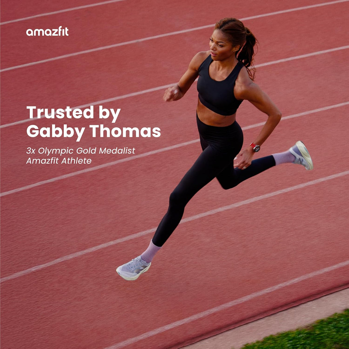 Woman running on track wearing Amazfit Active 2 black sport silicone smartwatch on wrist