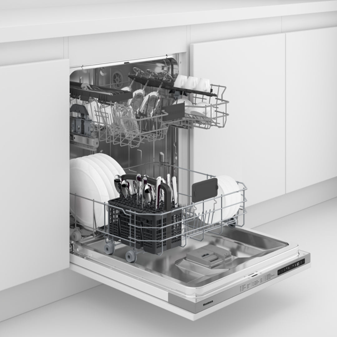Blomberg integrated dishwasher open with loaded racks showing plates, cutlery, and glasses inside a white kitchen unit.