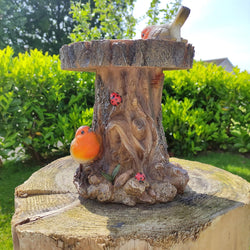 Bird Feeder BC Treetrunk Feeder with natural wood design, durable construction – available at Keans Claremorris.