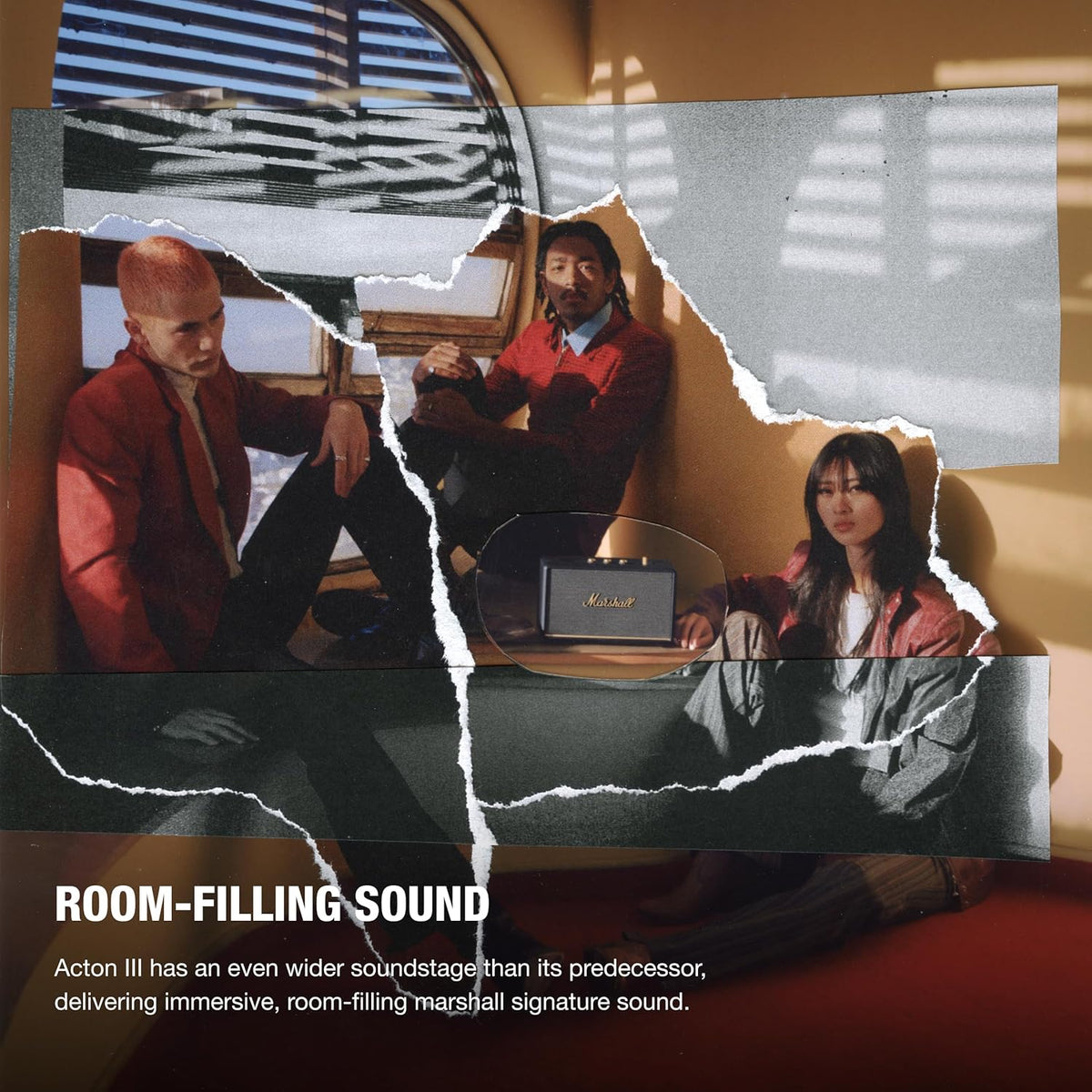 Marshall Acton III Bluetooth speaker in black on a wooden surface with torn paper collage and three people in the background.