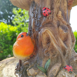 Bird Feeder BC Treetrunk Feeder with natural wood design, durable construction – available at Keans Claremorris.