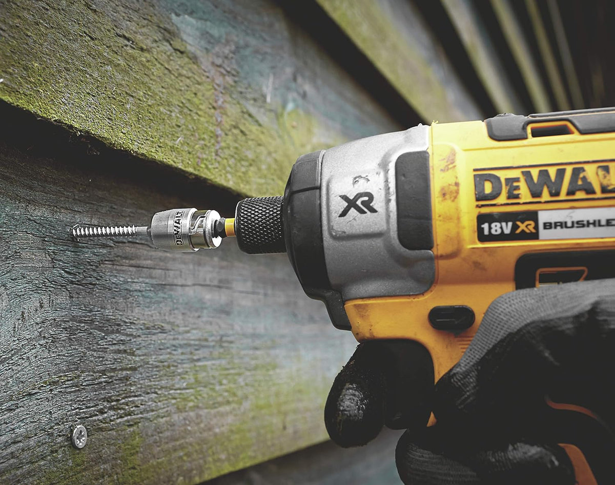 DeWalt impact driver with magnetic screwlock sleeve and PZ2 x 50mm torsion bit driving a screw into wood