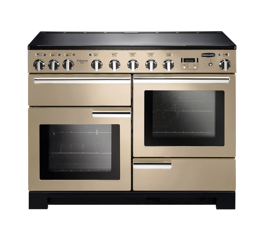 Rangemaster Professional Deluxe 110 induction cooker in beige with double ovens and multiple control knobs.
