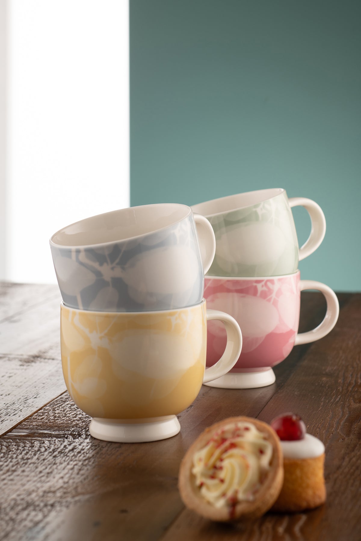 Belleek Living Laurel Footed Mug Set of 4, elegant ceramic cups with footed base, available at Keans Claremorris