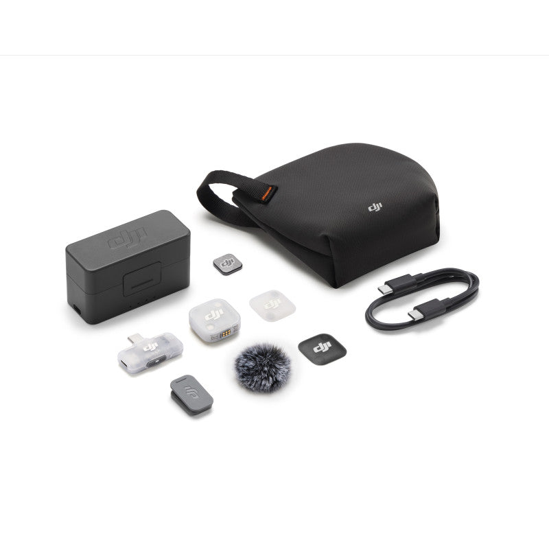 DJI Mic Mini 2 wireless microphone system with charging case, USB-C cable, windscreen, magnetic covers, and carrying pouch.