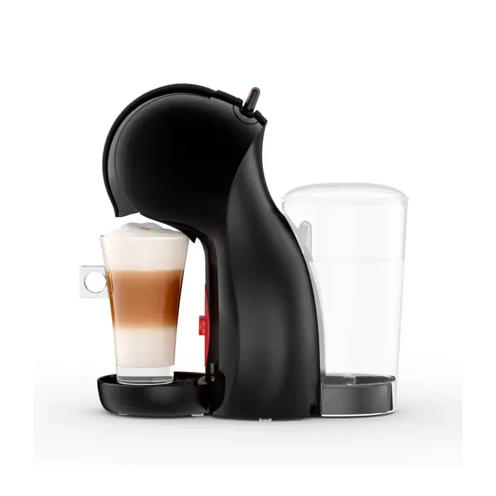 Black DeLonghi Piccolo XS Nescafe Dolce Gusto coffee machine with a glass of layered latte on the drip tray