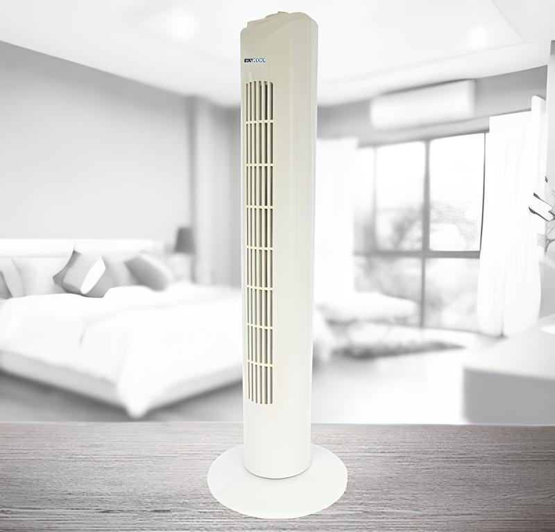 Lloytron 32'' white tower fan standing on a wooden surface with a blurred bedroom background.
