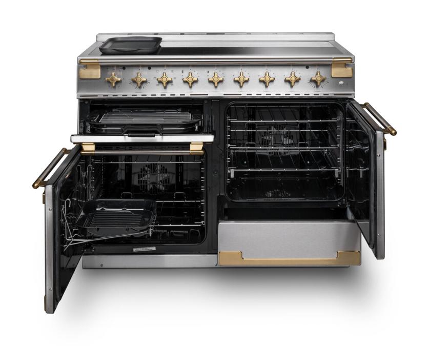 Rangemaster Elise 110cm induction cooker with open ovens, black finish, and antique brass trim details.