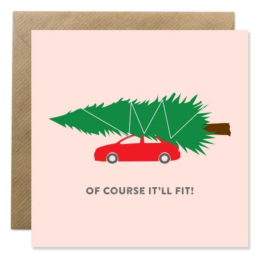 Christmas card with a red car carrying a large green tree tied on top, text "Of course it'll fit!" on pale pink background.