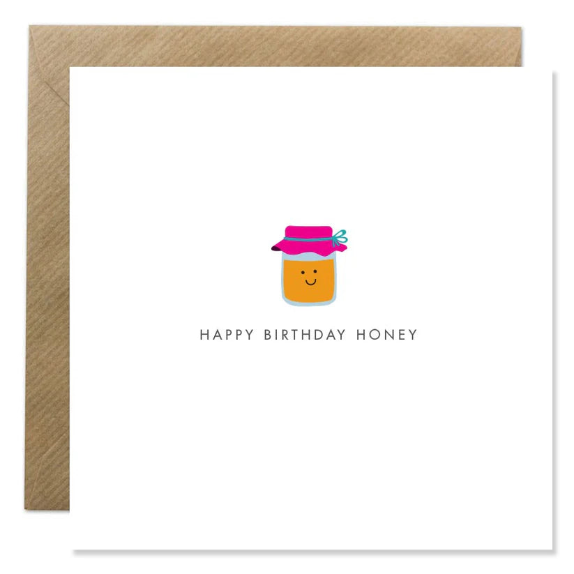 BBunny Happy Birthday Honey card with smiling honey jar illustration and kraft brown envelope on white background