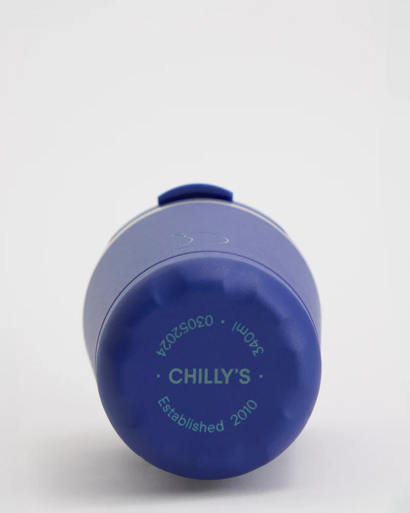 Matte blue Chillys Coffee Cup 340ml shown from the bottom with logo and text visible