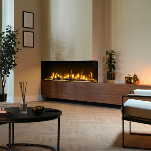 Dimplex Ignite Bold 50″ electric fire with glowing flames set in a modern living room corner.