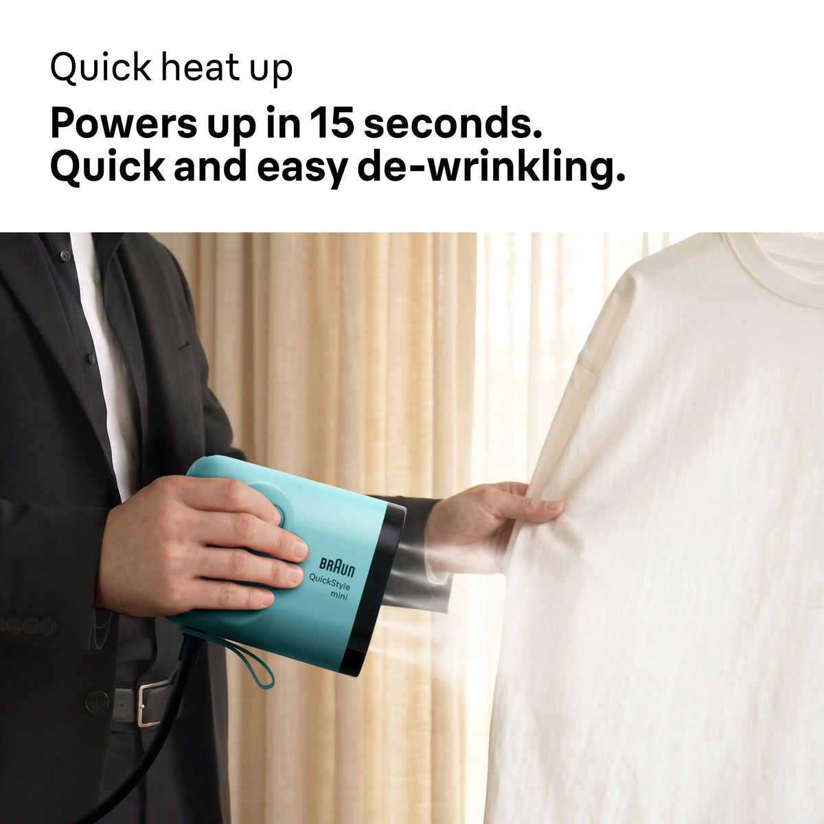 Person using a green Braun Carestyle Mini Travel Garment Steamer on a white shirt indoors