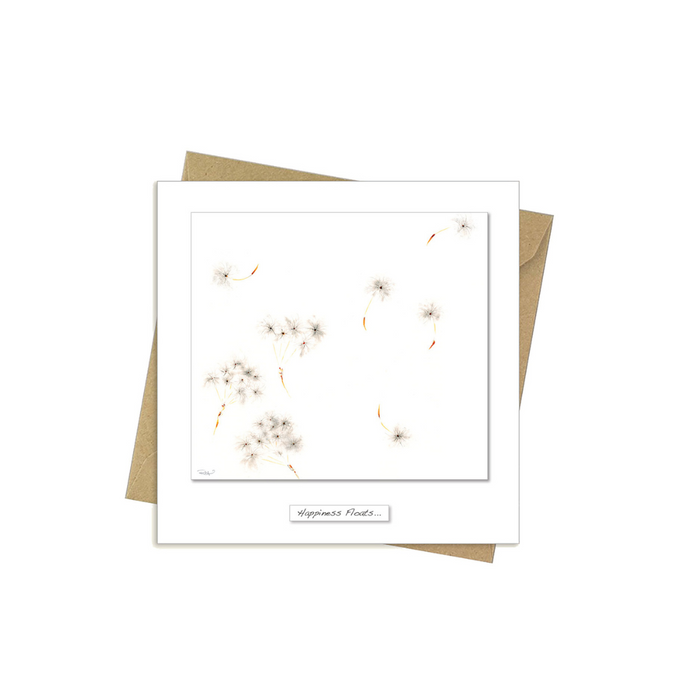 Happiness Floats t-shirt with dandelion seed design, inspiring freedom and contentment – Keans Claremorris.