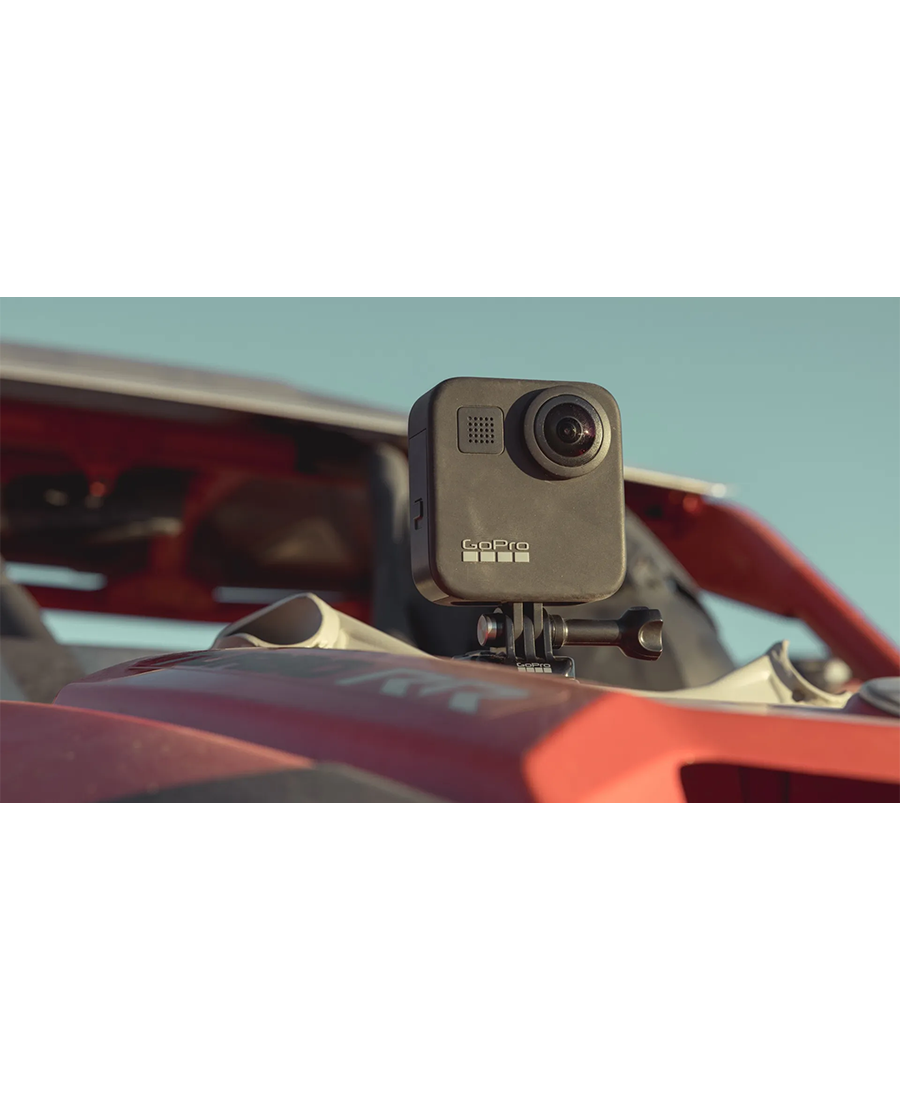 GoPro Hero Max 360 Action Camera mounted on a red off-road vehicle under clear sky.