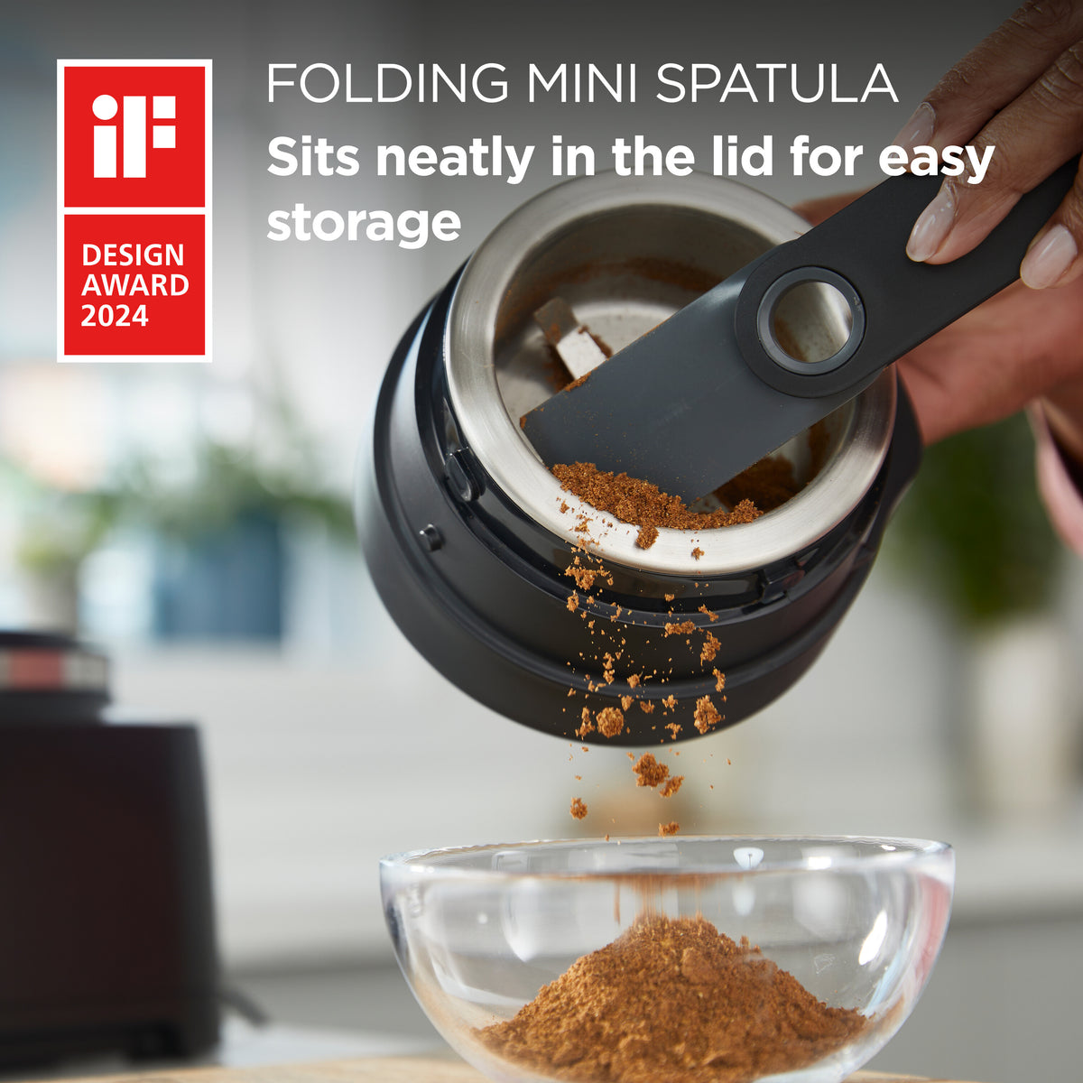 Kenwood Autograph Duo Prep 2 in 1 Chopper/grinder with ground spice falling into a glass bowl