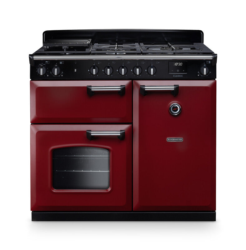 Rangemaster Classic 100cm dual fuel cooker in red with chrome handles, oven window, and black control panel