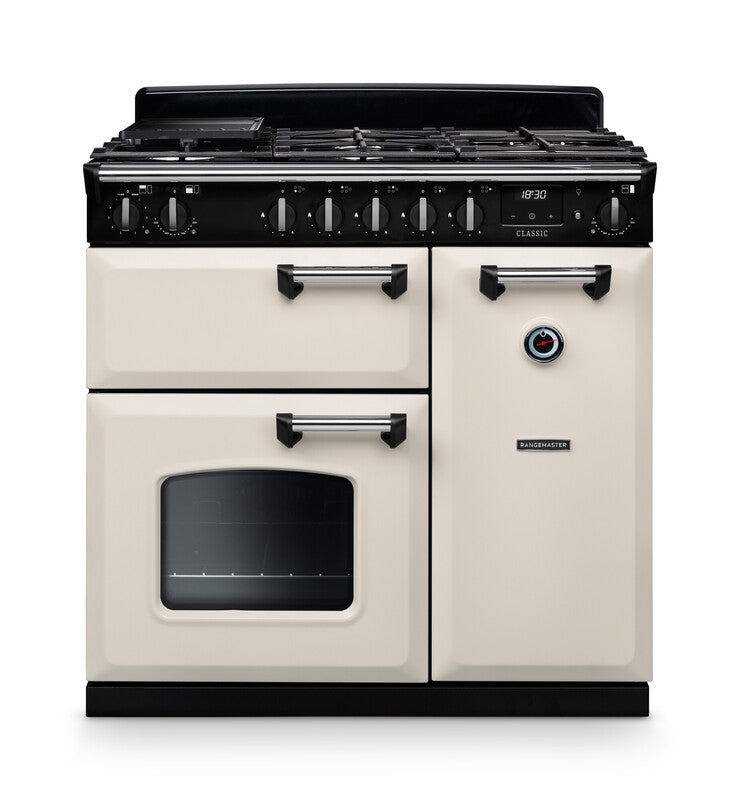 Rangemaster Classic 90cm cream dual fuel rangecooker with six burners and three oven doors visible front view