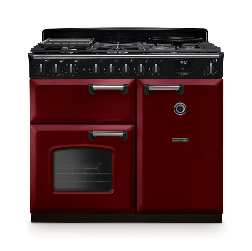 Rangemaster Classic Deluxe 100cm chrome dual fuel rangecooker in burgundy with multiple ovens and burners