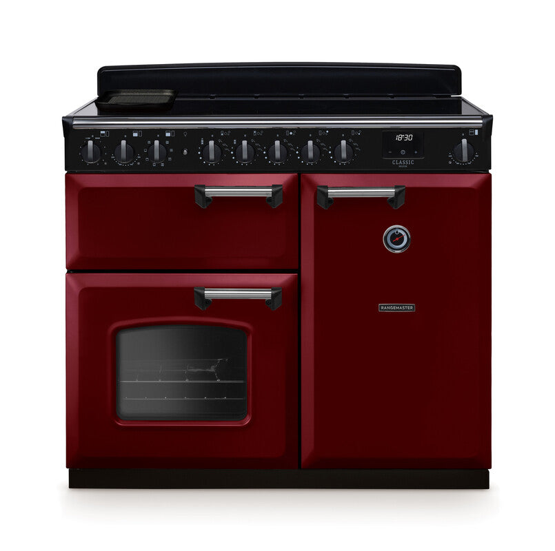 Rangemaster Classic Deluxe 100cm induction rangecooker in deep red with chrome handles and black control panel