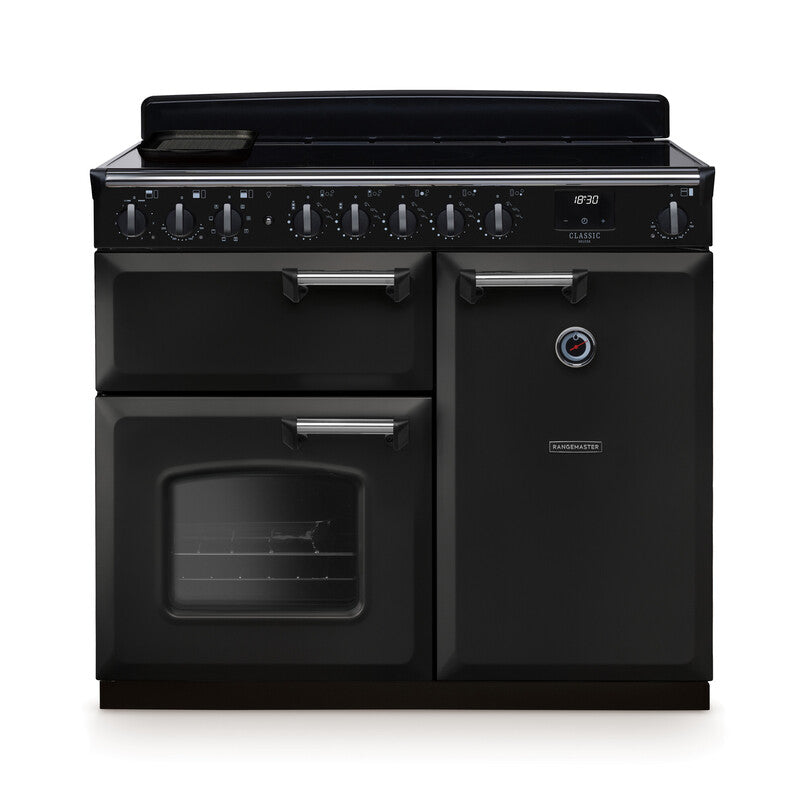 Rangemaster Classic Deluxe 100cm black induction rangecooker with multiple ovens and control knobs