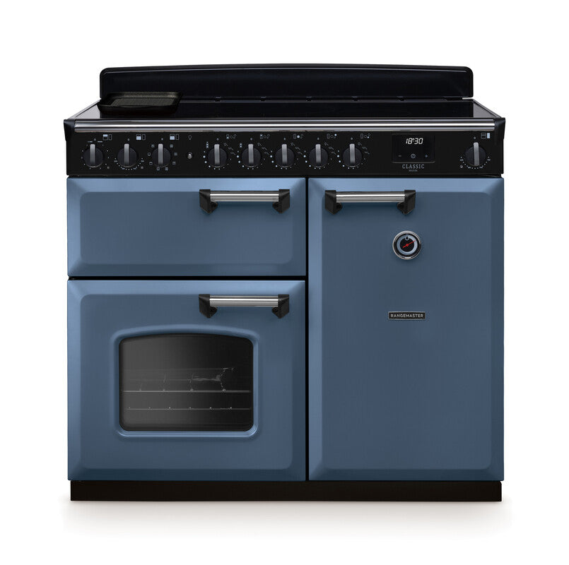 Rangemaster Classic Deluxe 100cm blue induction rangecooker with multiple ovens and control knobs