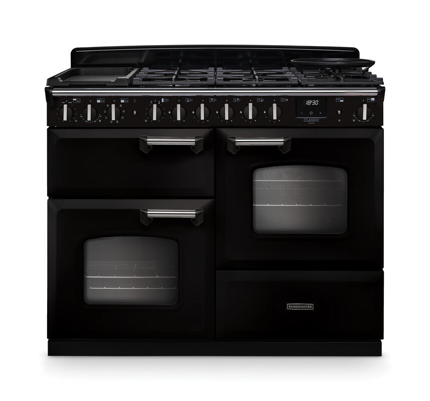 Rangemaster Classic Deluxe 110 cm dual fuel range cooker in black with three ovens and six-burner gas hob