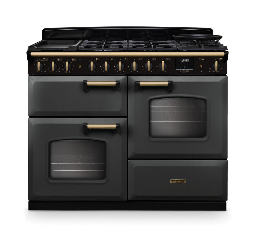 Rangemaster Classic Deluxe 110 dual fuel cooker in slate with antique brass handles and trim, front view.