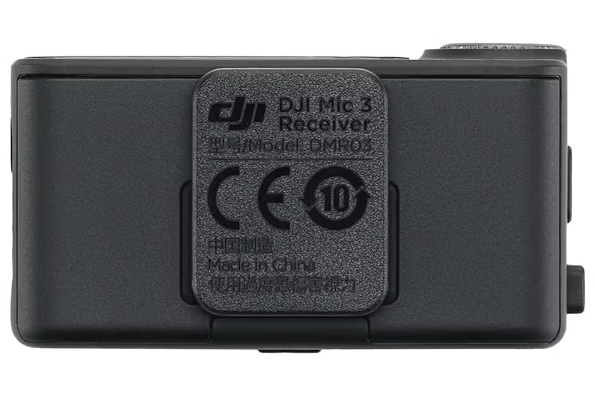 Dji Mic 3 Receiver shown from the back with model and certification markings visible on a clip.