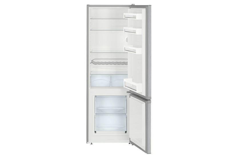 Liebherr freestanding fridge freezer with open doors showing empty shelves, drawers, and door compartments.