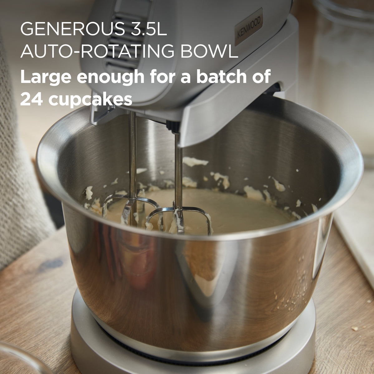 Close-up of Kenwood Chefette Mixer Silver with batter in the stainless steel mixing bowl and beaters attached
