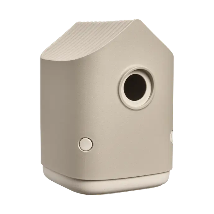 Beige mushroom-shaped cosy bird house with a round entrance hole and textured roof detail.