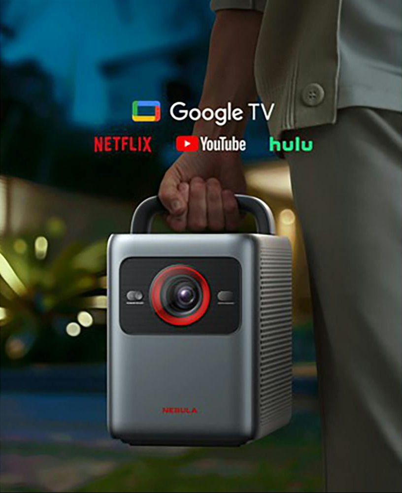 Hand holding Nebula Cosmos 4k SE projector with Google TV, Netflix, YouTube, and Hulu logos above.