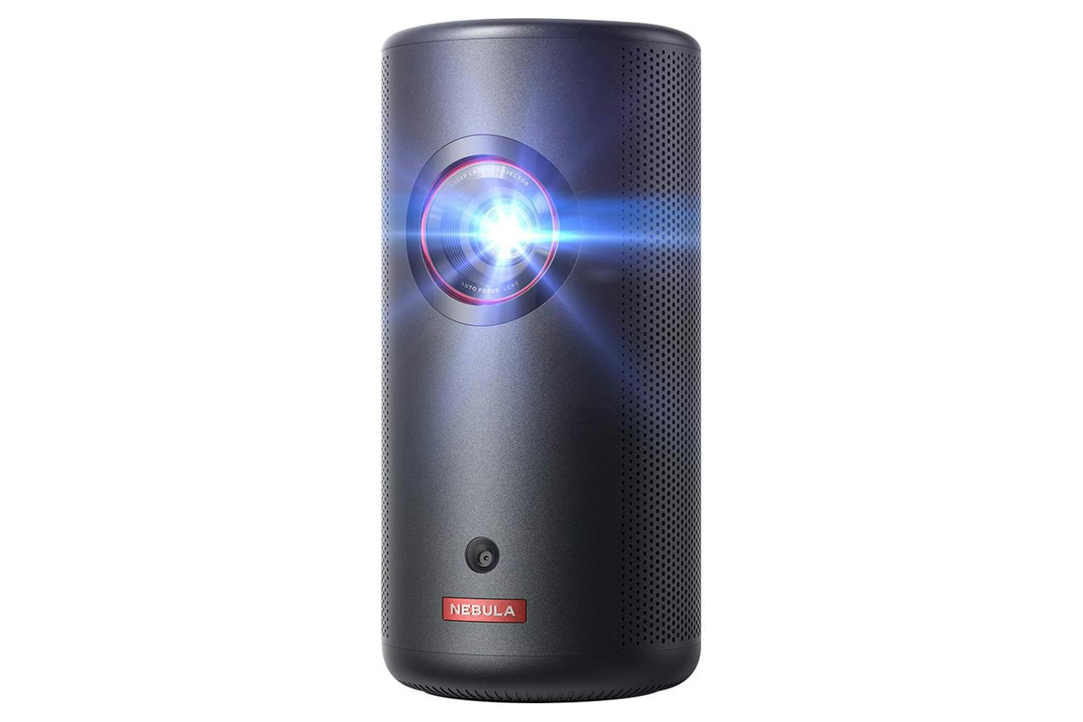 Nebula Capsule 3 portable projector in black with lens light on and perforated speaker grille.